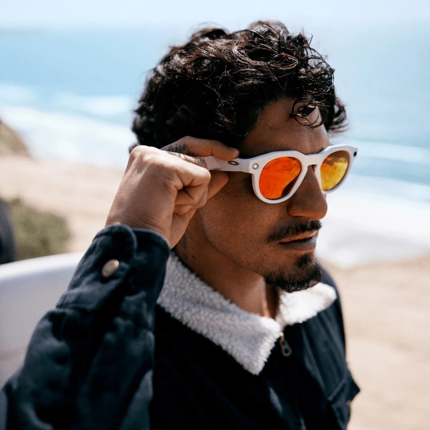 A person wearing Oakley Meta AI glasses